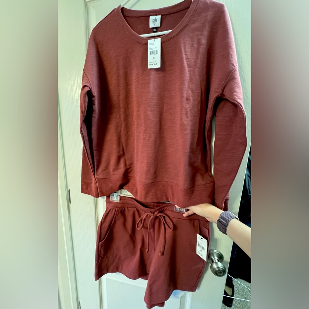 New with tags. Cabi training sweatshirt and shorts set.  Burgundy. Size medium